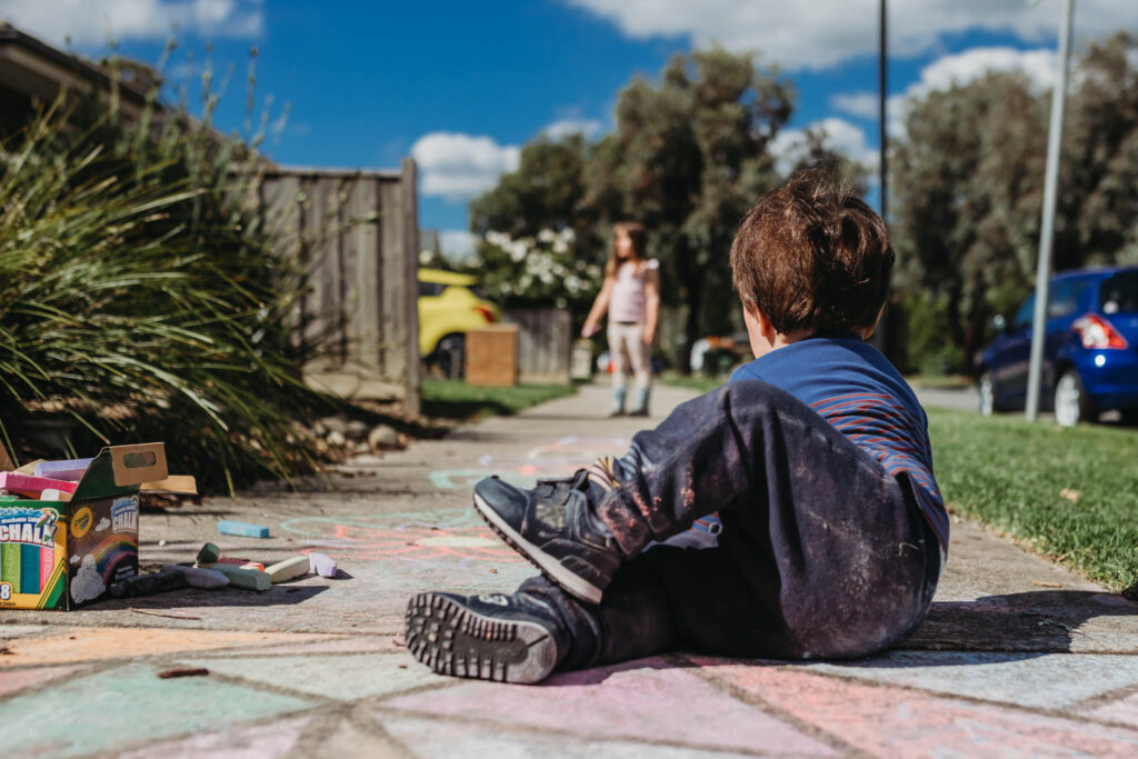 Chalk drawings on footpath during lockdown in Melbourne
