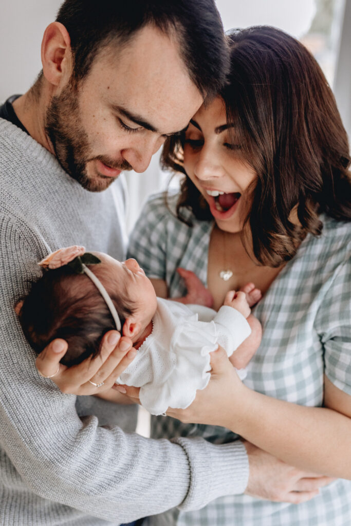 Newborn baby photographed in natural light at home