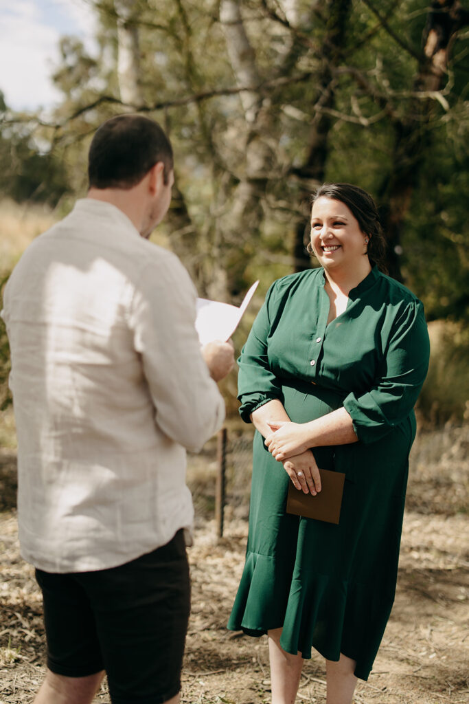 Husband reading vows at microwedding in Melbourne