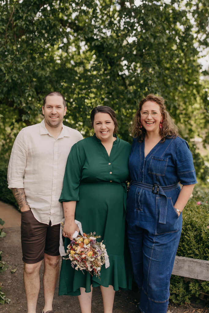 Megan Jordan, celebrant, with happy couple at micro wedding in Melbourne. 