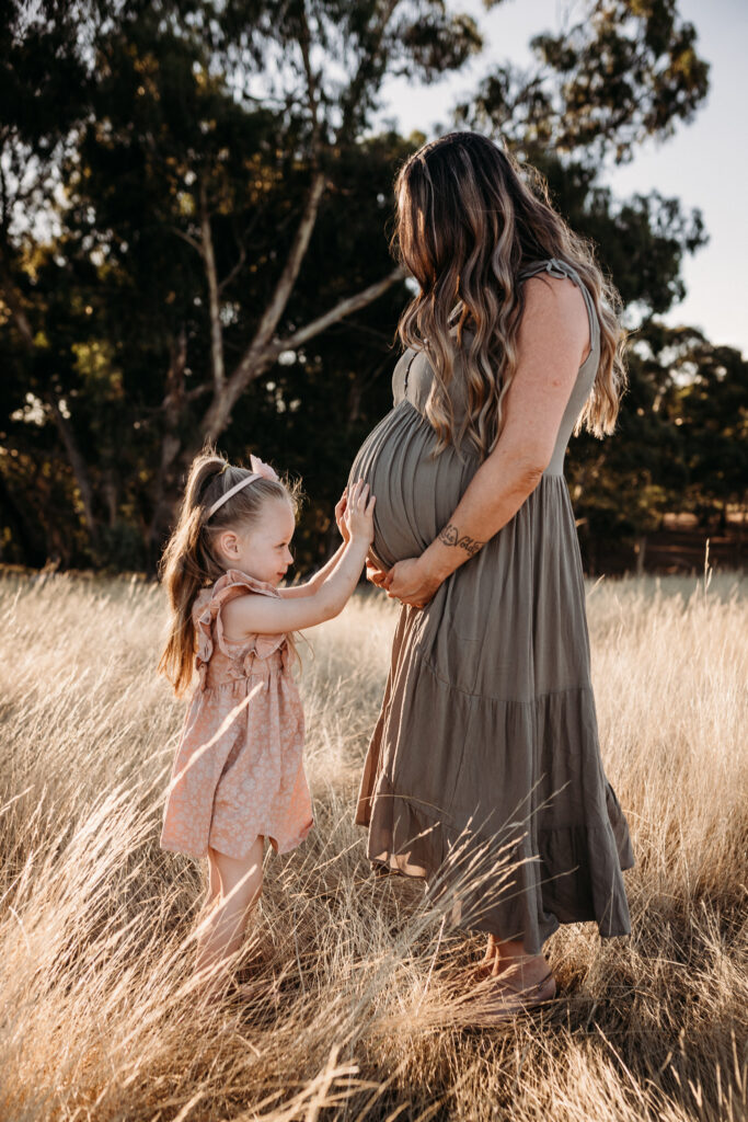 beautiful muted earthy tones in natural field - what to wear for family photos