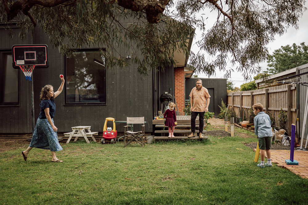 wearing clothes for comfort in family photoshoot, playing cricket